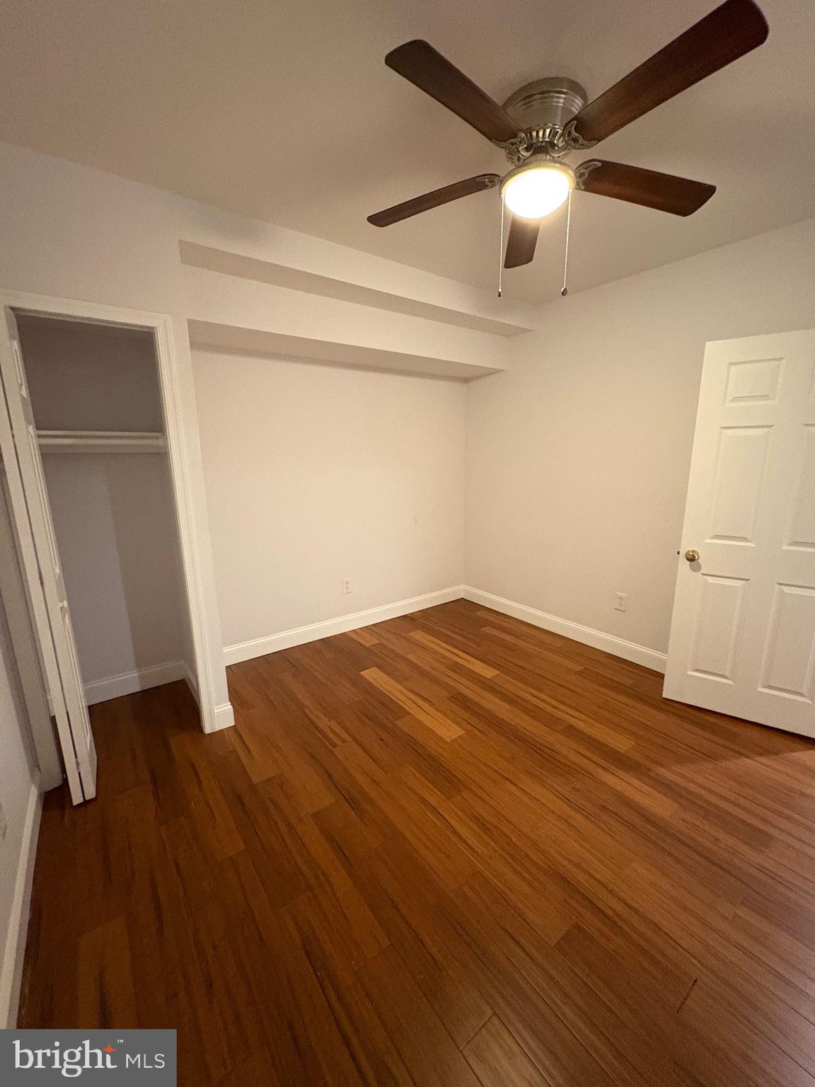 116 Grape Street, Unit 6 Philadelphia, PA 19127 - Photo 22 of 27 wooden floor in an empty room