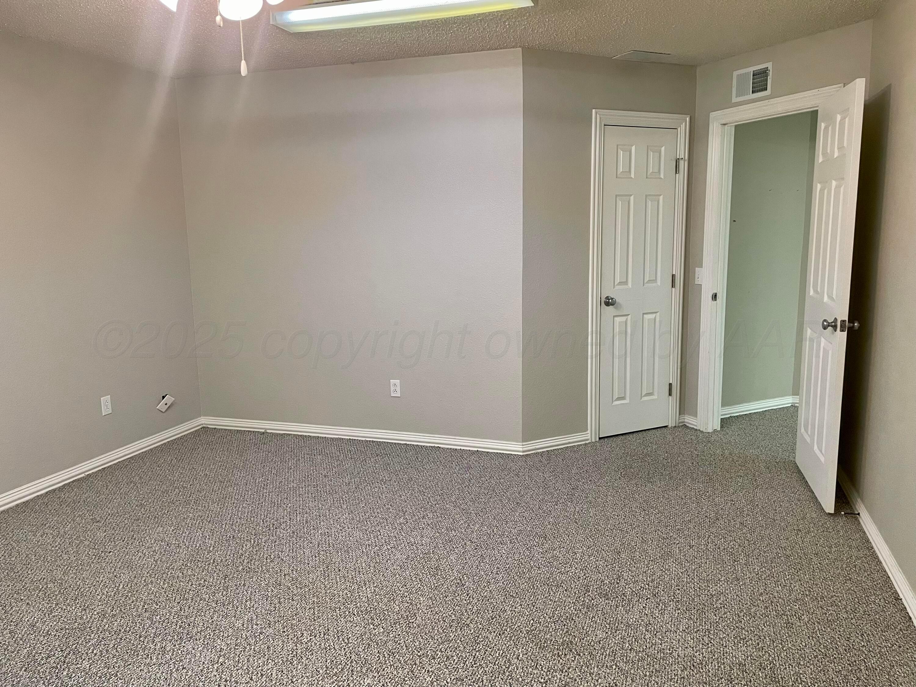 522 Carson Avenue Dumas, TX 79029 - Photo 8 of 18 a view of an empty room