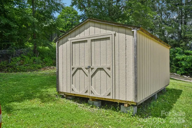 a wooden door in front of a house