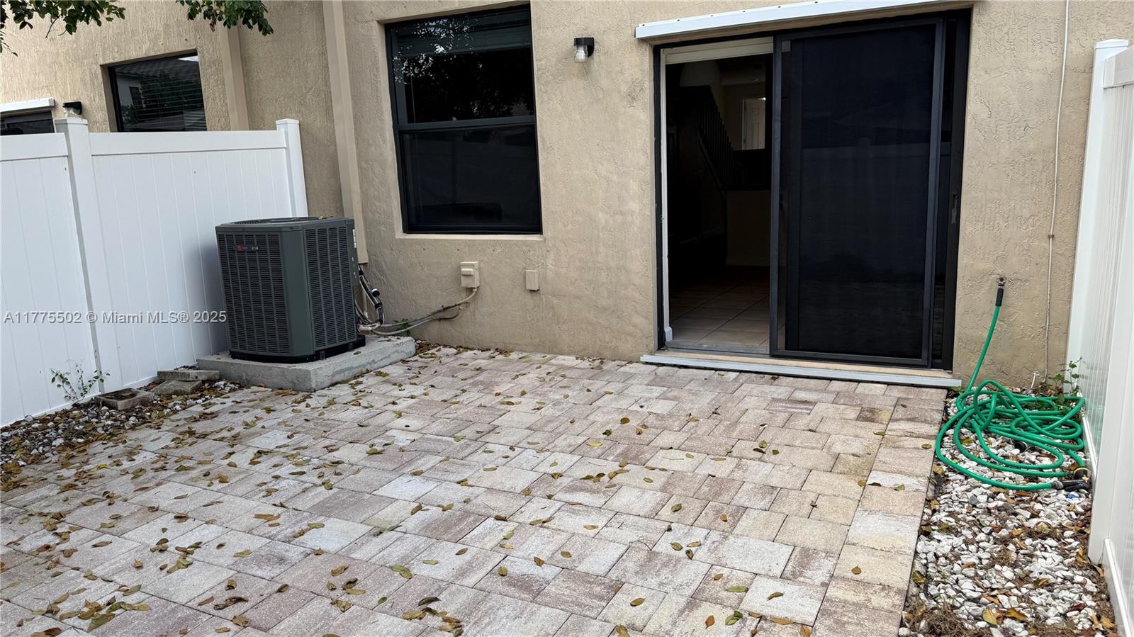 9213 West 33rd Way Hialeah, FL 33018 - Photo 11 of 13 a backyard of a house