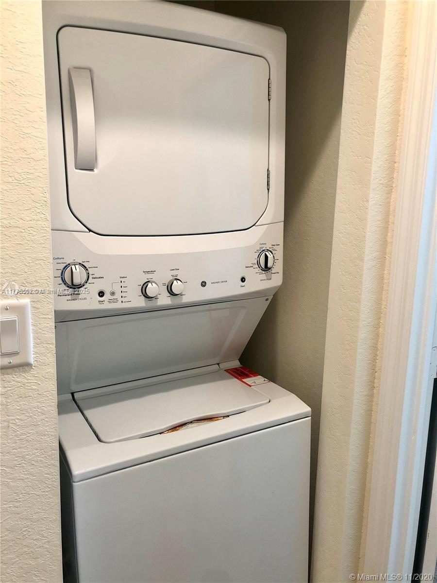 9213 West 33rd Way Hialeah, FL 33018 - Photo 7 of 13 a utility room with dryer and washer