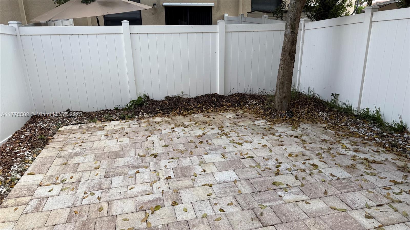 9213 West 33rd Way Hialeah, FL 33018 - Photo 10 of 13 a view of a backyard of the house