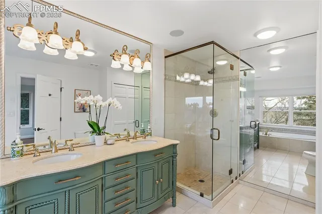 a bedroom with a bed and a book shelf