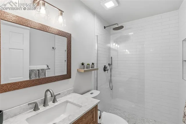 a view of workspace with furniture and window