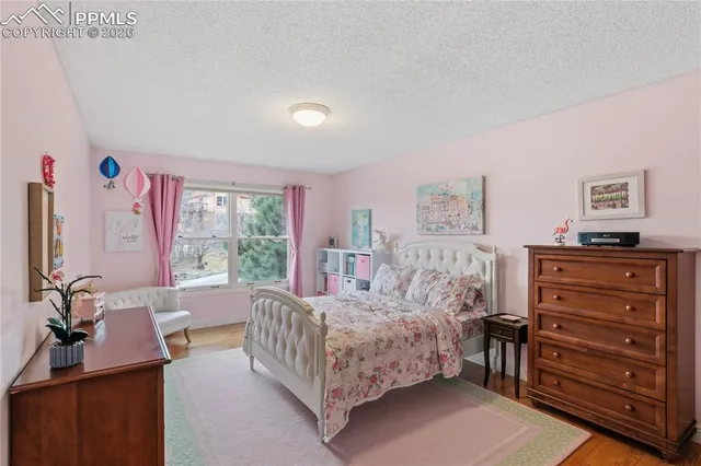 a room with furniture and a book shelf