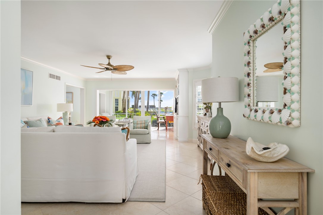 1180 Reef Road, Unit B7 Vero Beach, FL 32963 - Photo 4 of 28 a view of kitchen and dining room with furniture