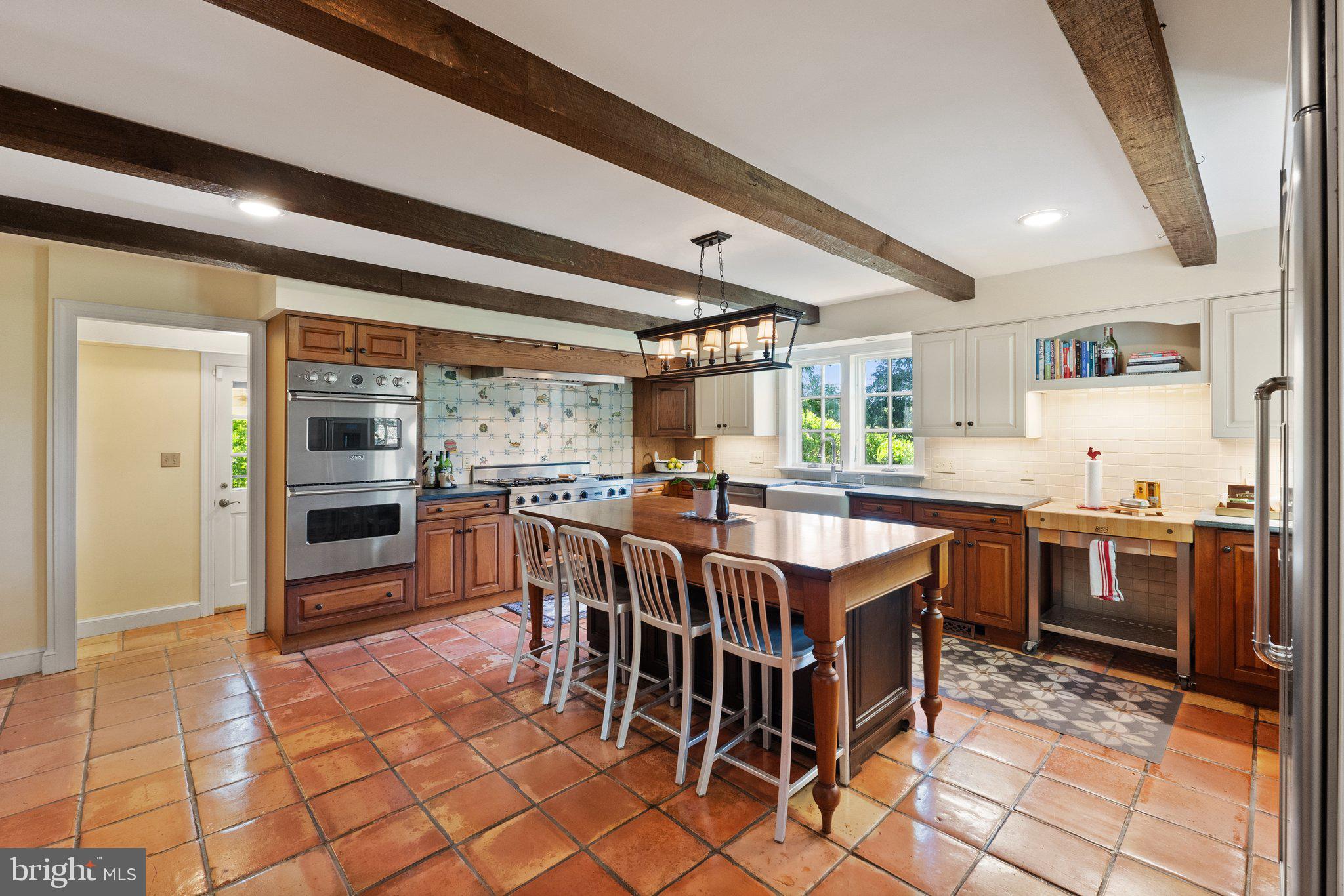 21056 Beaverdam Bridge Road Middleburg, VA 20117 - Photo 12 of 109 Large Kitchen with Baked Tile Flooring with Island