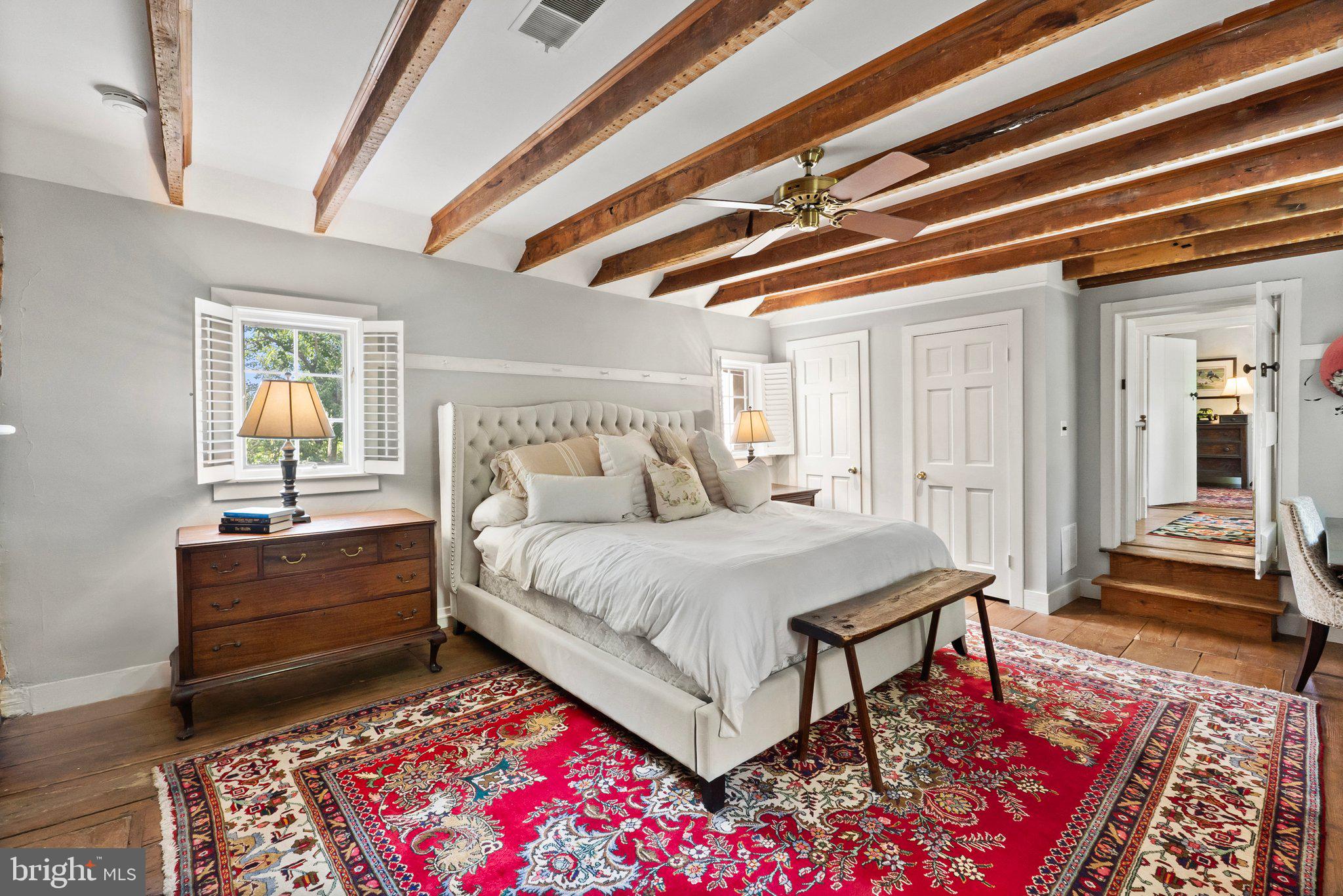 21056 Beaverdam Bridge Road Middleburg, VA 20117 - Photo 36 of 109 Primary Bedroom with Exposed Wood Beams