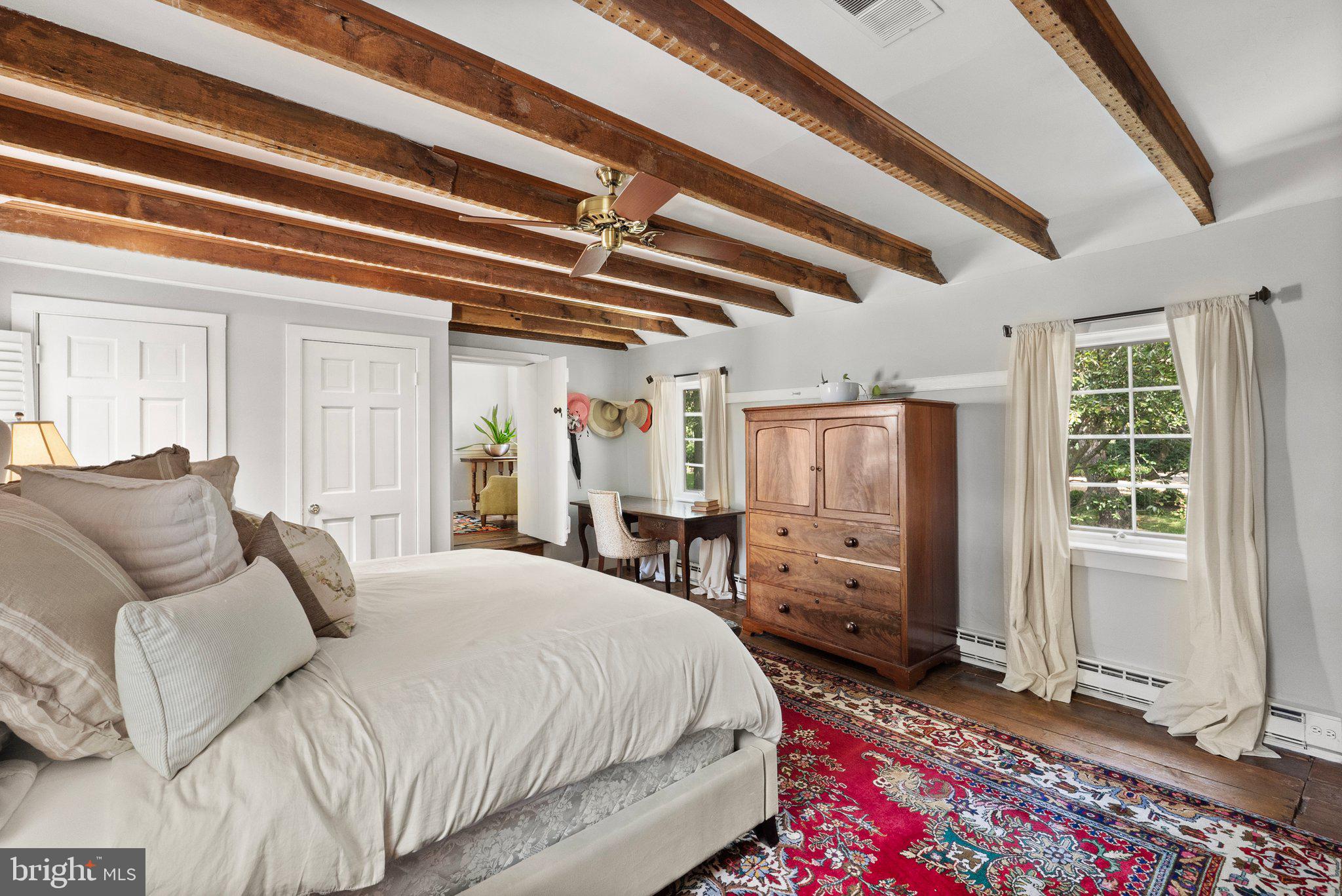 21056 Beaverdam Bridge Road Middleburg, VA 20117 - Photo 38 of 109 Primary Bedroom with Exposed Wood Beams
