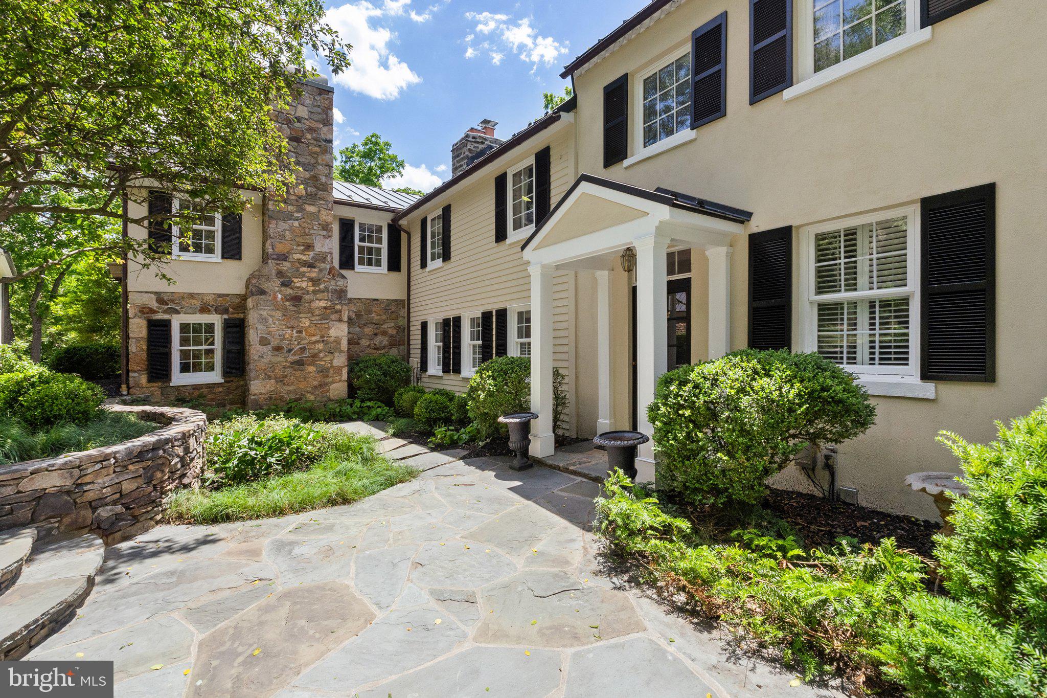 Flagstone Courtyard with Stone Walls