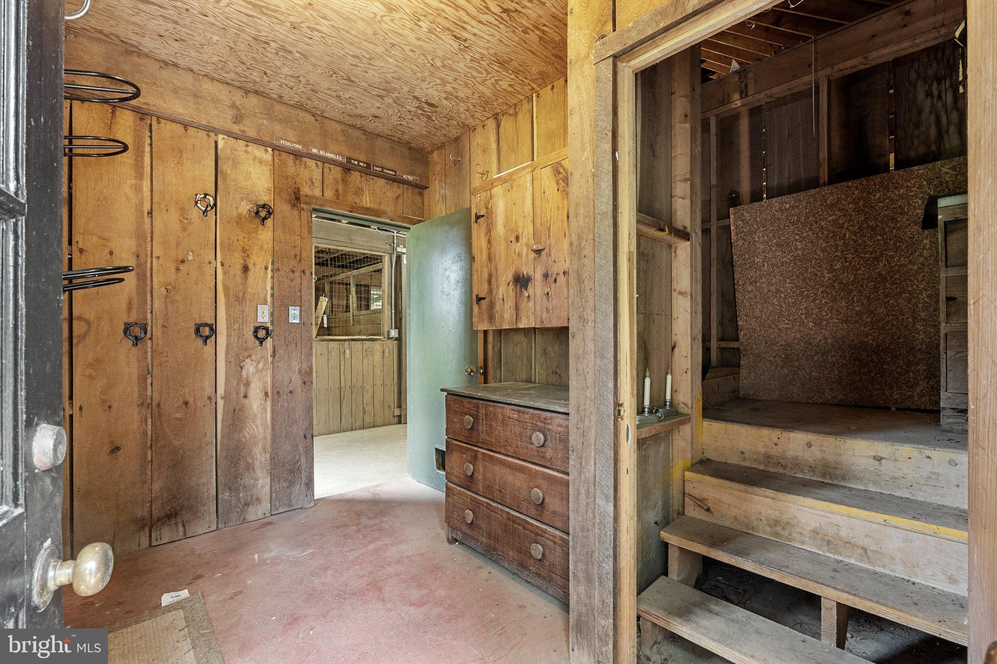 21056 Beaverdam Bridge Road Middleburg, VA 20117 - Photo 90 of 109 Tack Room and Stairs to Hay Loft Storage