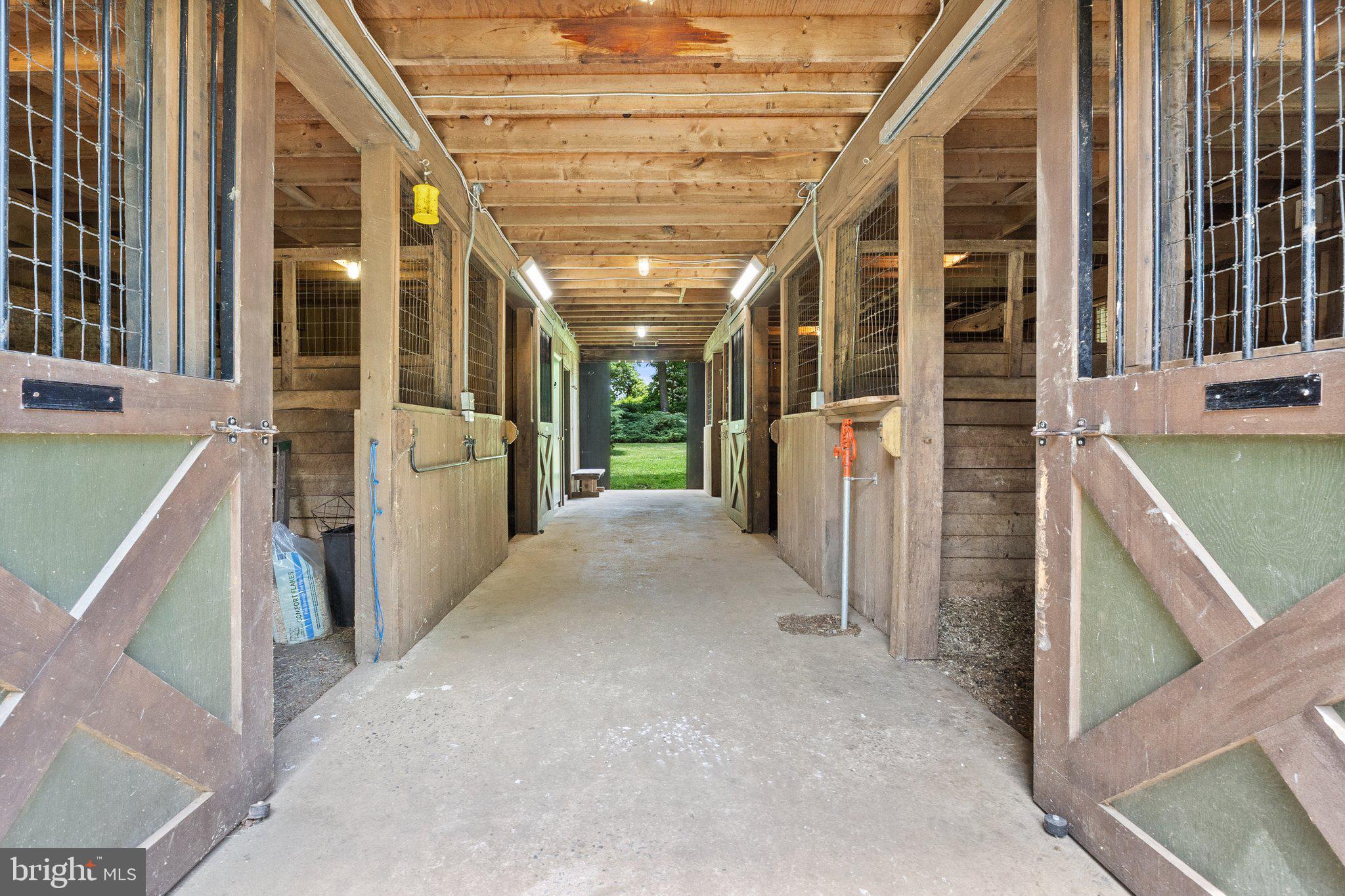 21056 Beaverdam Bridge Road Middleburg, VA 20117 - Photo 93 of 109 Large Center Isle Style Barn