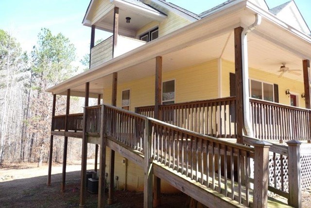2998 Stokes Store Road Forsyth, GA 31029 - Photo 3 of 8 a view of a balcony with furniture