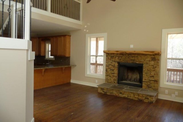 2998 Stokes Store Road Forsyth, GA 31029 - Photo 5 of 8 a living room with a fireplace furniture and a fireplace
