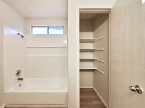 a bathroom with a bathtub