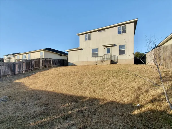 a large house with a large outdoor space