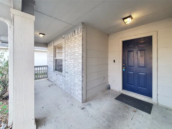 wooden floor in an empty room and a window