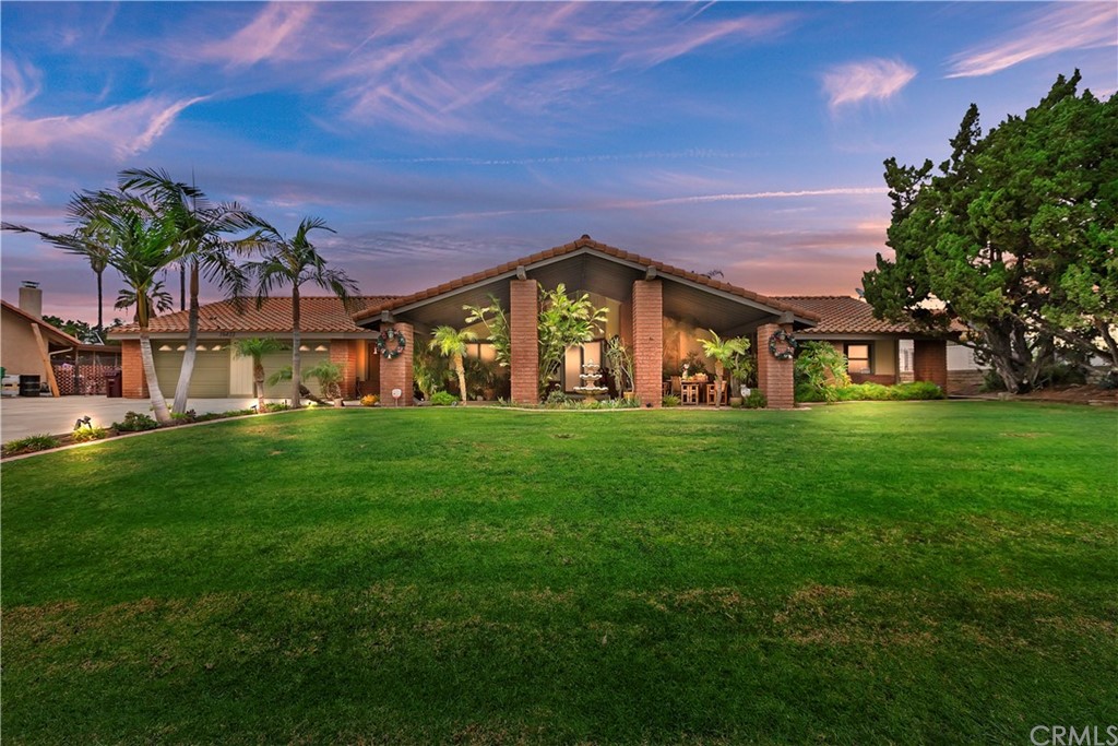 16422 Rancho Escondido Drive Riverside, CA 92506 - Photo 1 of 1 a front view of a house with a yard