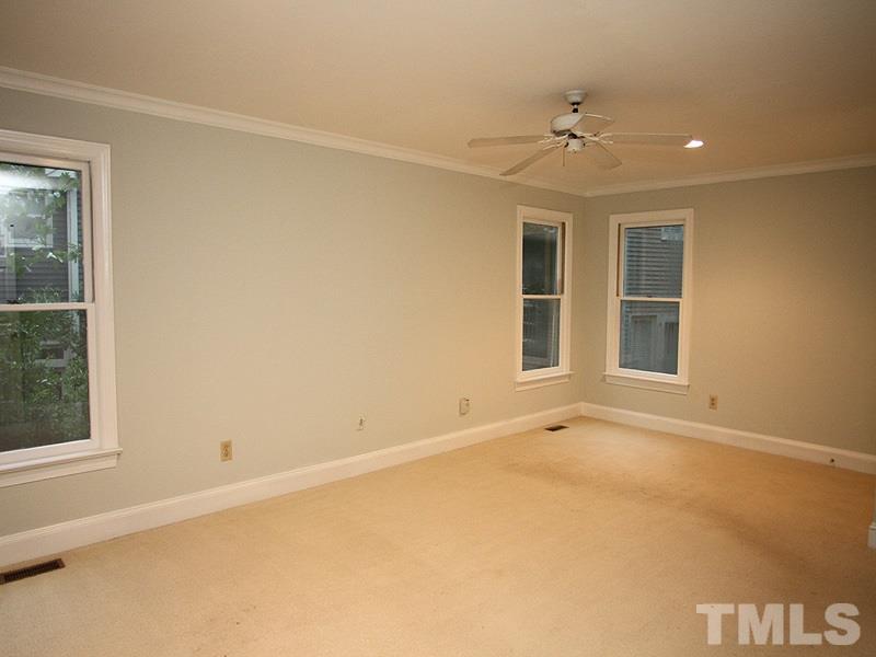 2109 Camrose Street Raleigh, NC 27608 - Photo 6 of 12 a view of an empty room with a window