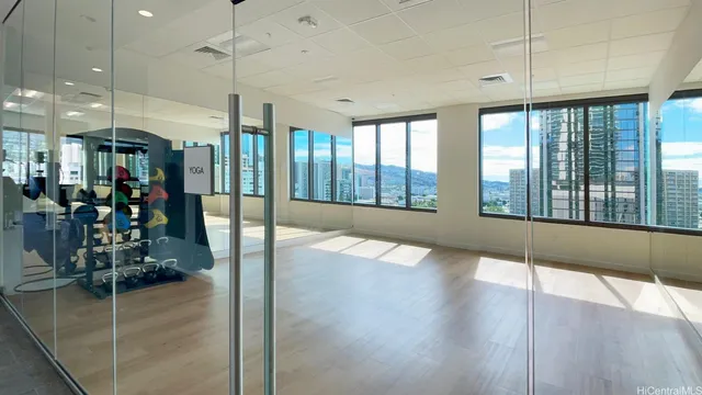 a view of a room with lots of wooden floor