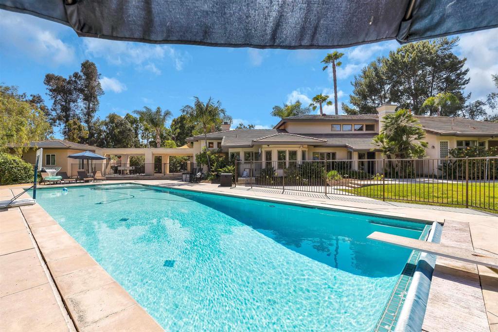 a view of a house with a swimming pool