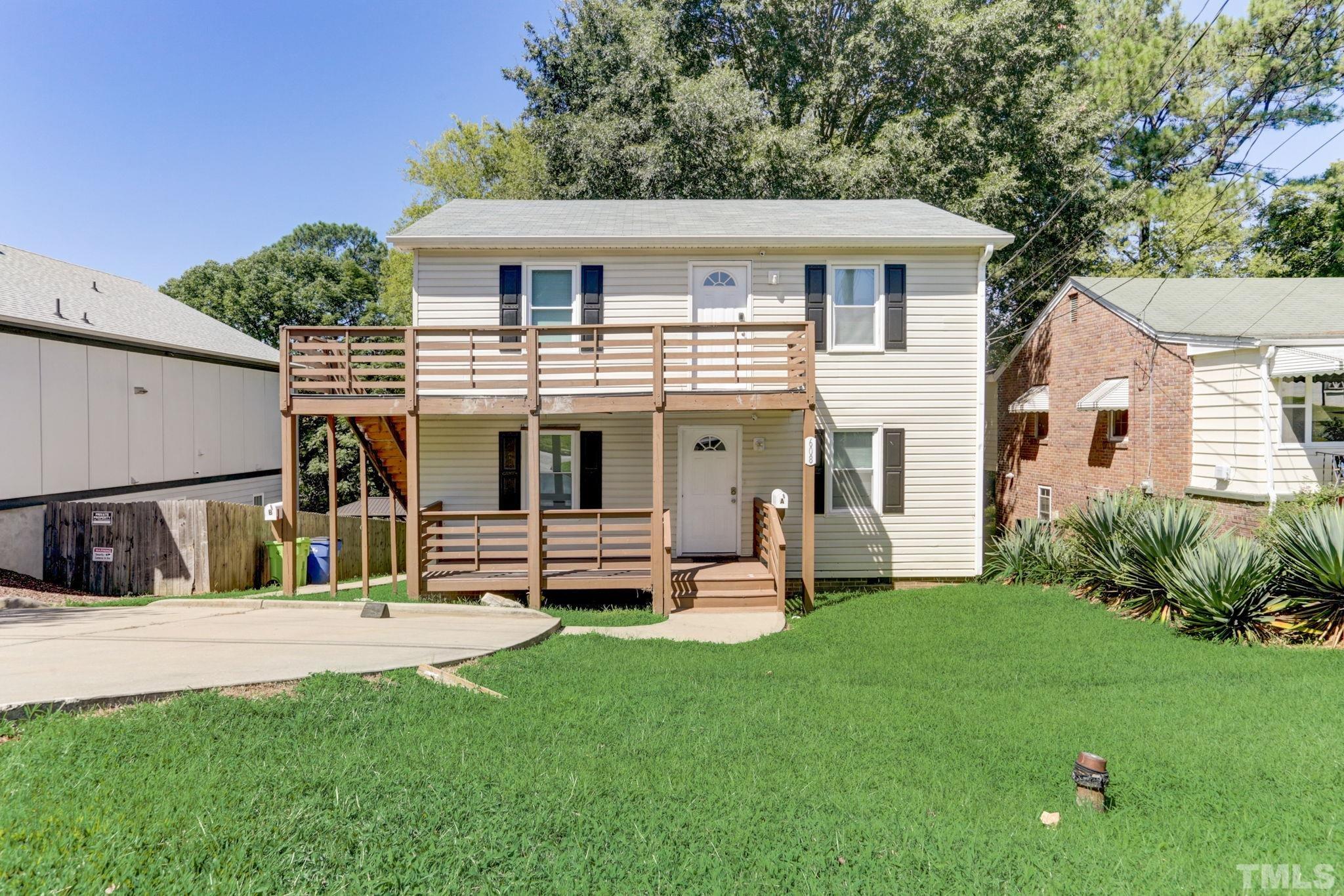 608 Quarry Street Raleigh, NC 27601 - Photo 1 of 15 a view of an house with backyard space and garden
