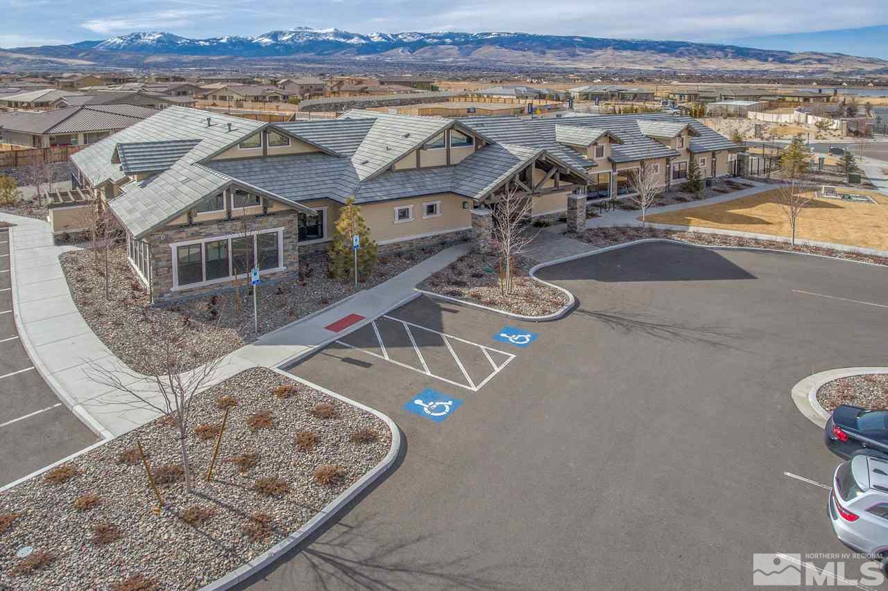 2930 Hasufel Way, Unit LOT #100 Reno, NV 89521 - Photo 3 of 19 an aerial view of a house with a garden and lake view