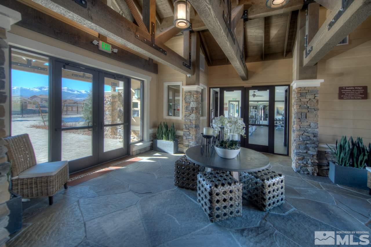 2930 Hasufel Way, Unit LOT #100 Reno, NV 89521 - Photo 5 of 19 a living room with furniture and a large window