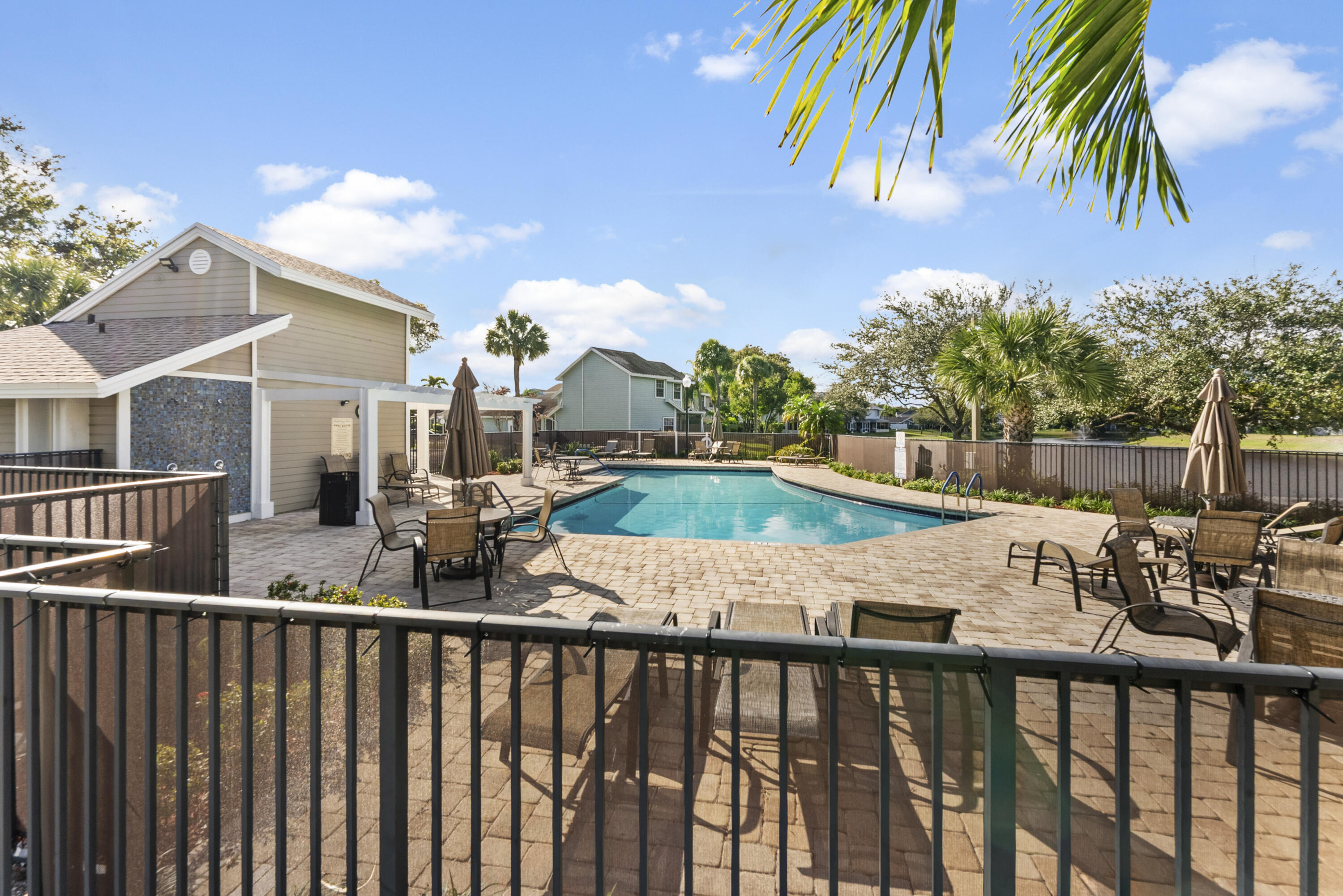 5359 Buckhead Circle, Unit 2031 Boca Raton, FL 33431 - Photo 11 of 25 a view of a balcony with wooden floor and fence