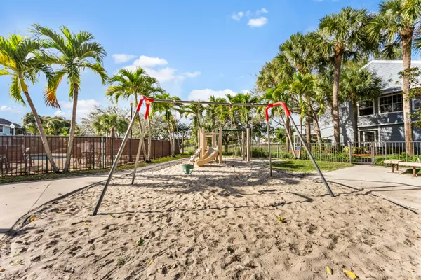 a view of a yard with palm tree