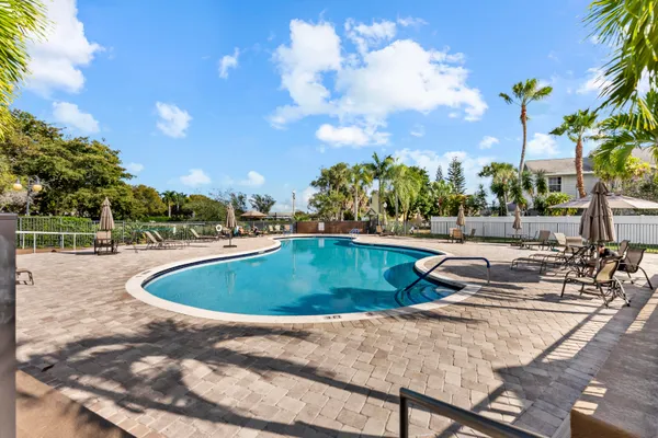 a view of a swimming pool with a terrace