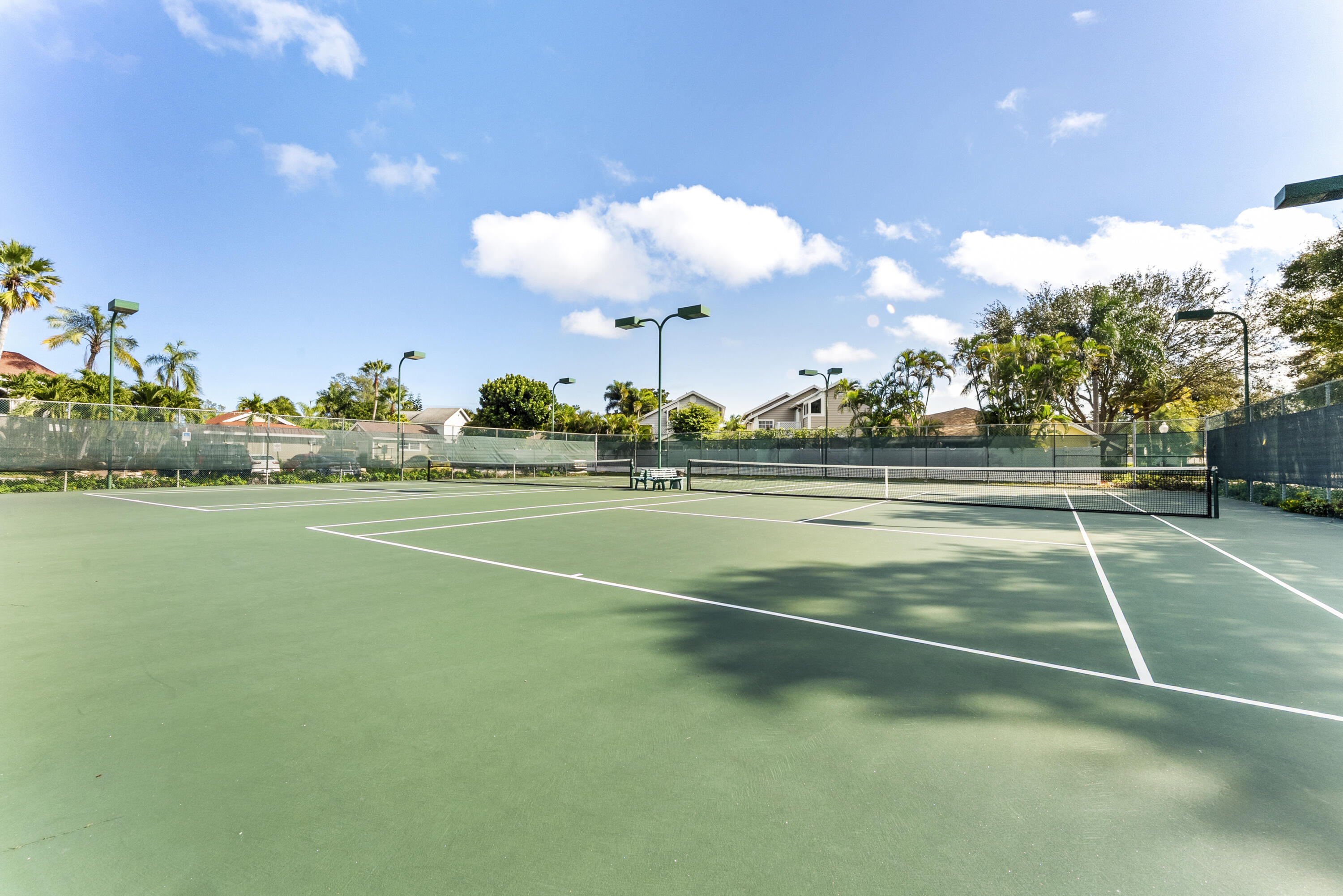 5359 Buckhead Circle, Unit 2031 Boca Raton, FL 33431 - Photo 10 of 25 a view of a tennis court