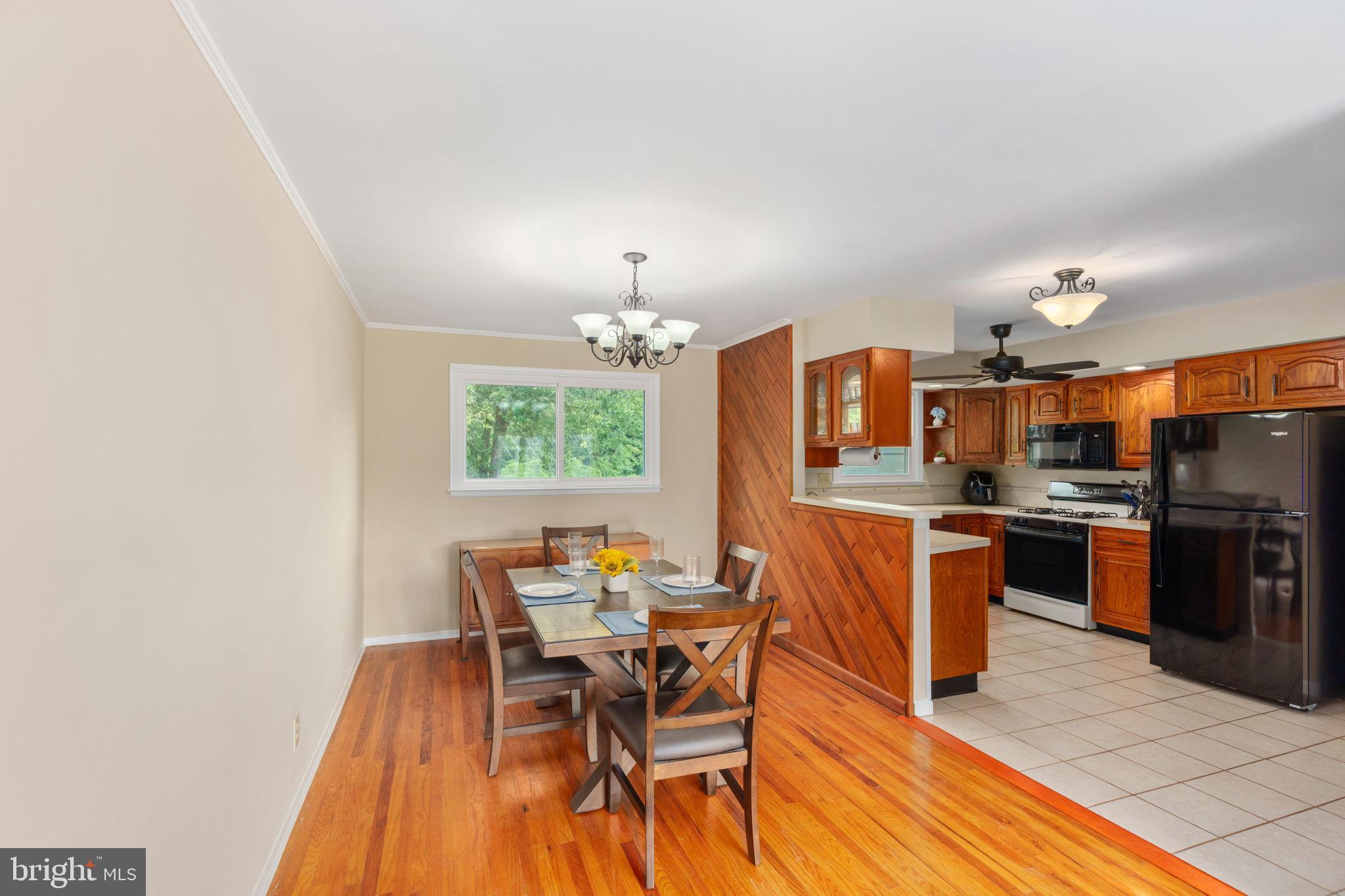 1001 Mueller Road Warminster, PA 18974 - Photo 13 of 39 Charming dining area with warm wood accents.
