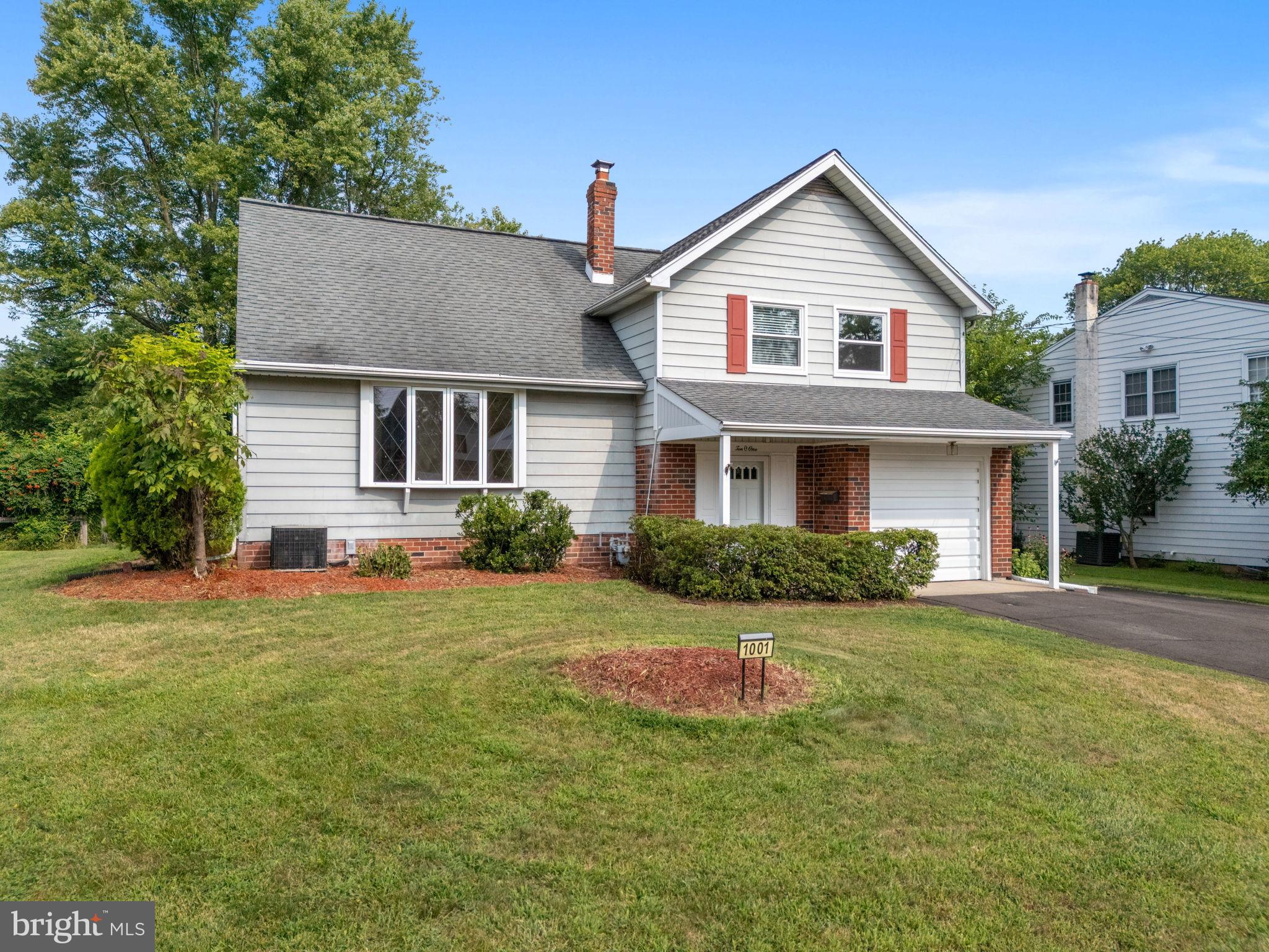 1001 Mueller Road Warminster, PA 18974 - Photo 2 of 39 Charming home with lush greenery and curb appeal.