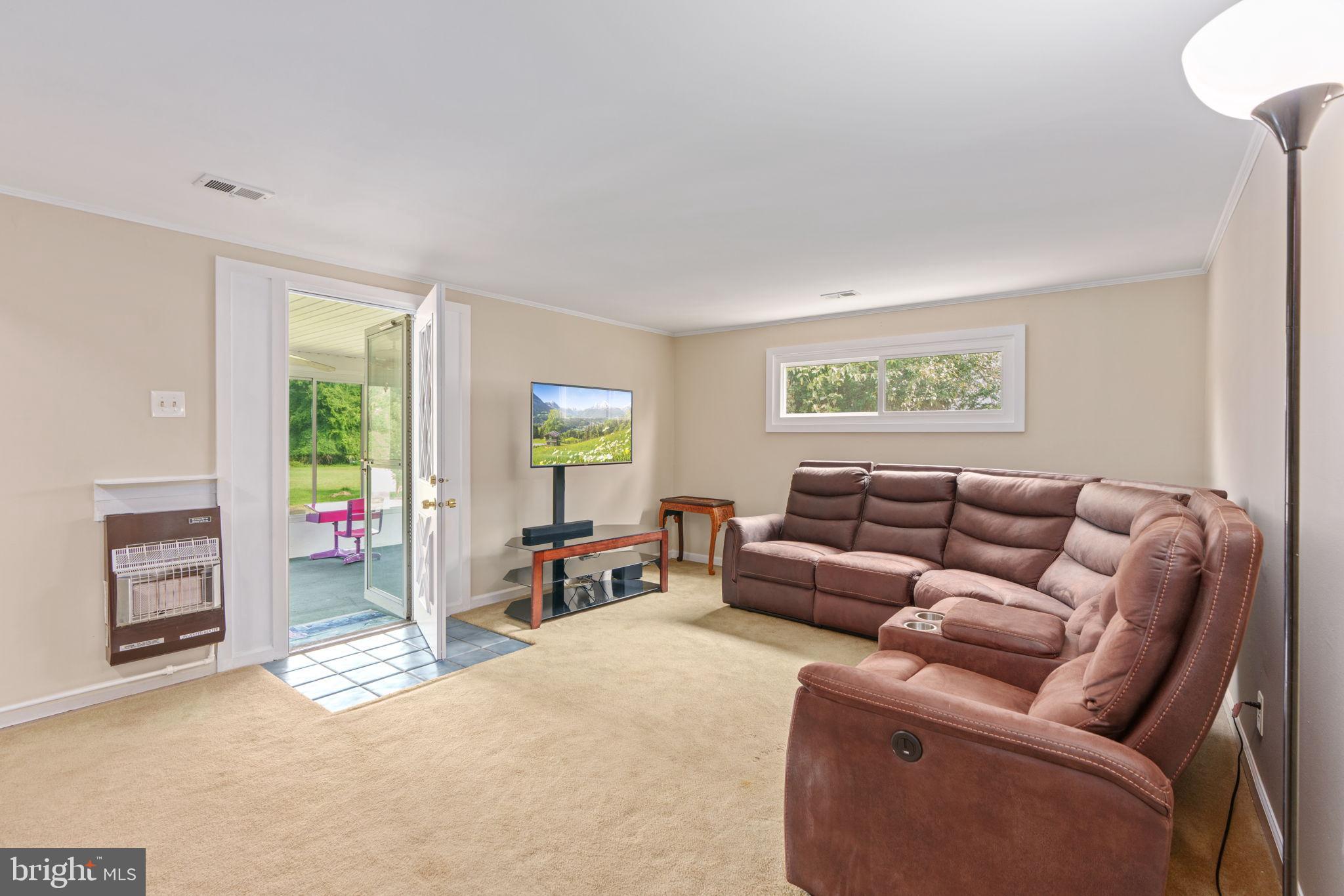 1001 Mueller Road Warminster, PA 18974 - Photo 21 of 39 1st floor family room with access to the porch!