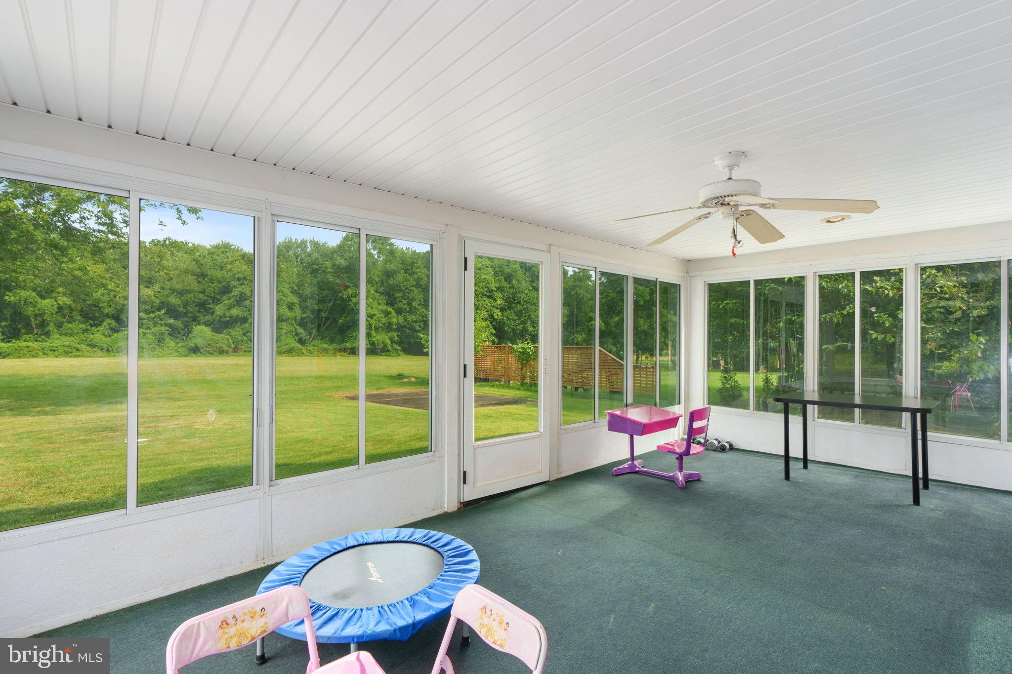 1001 Mueller Road Warminster, PA 18974 - Photo 34 of 39 Enjoy outdoor views on the three season sunroom
