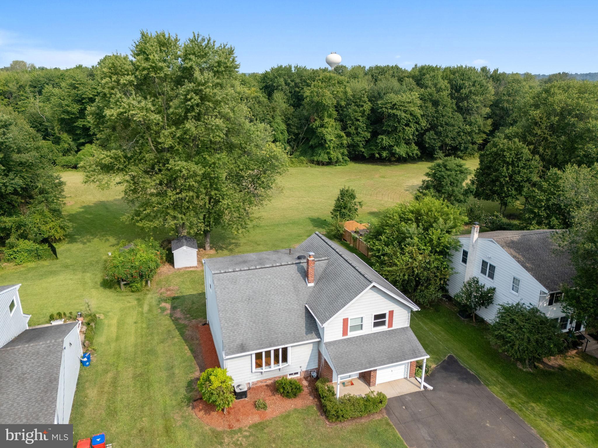 1001 Mueller Road Warminster, PA 18974 - Photo 37 of 39 Charming home nestled by lush greenery.