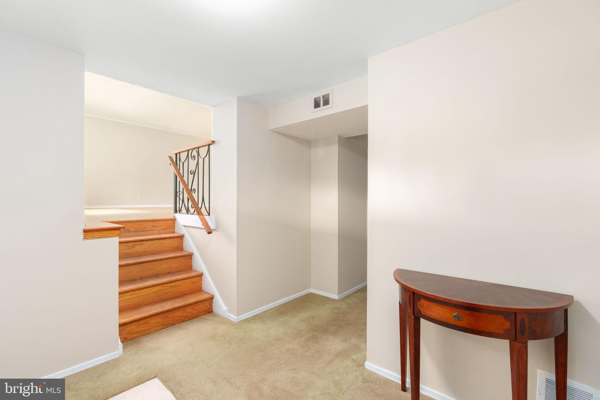 1001 Mueller Road Warminster, PA 18974 - Photo 7 of 39 Inviting entryway with wood stairs and foyer