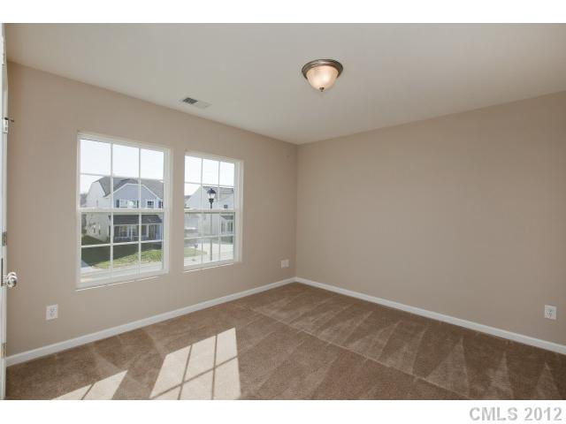 2211 Durand Road, Unit 77 Fort Mill, SC 29715 - Photo 12 of 16 a view of an empty room with a window