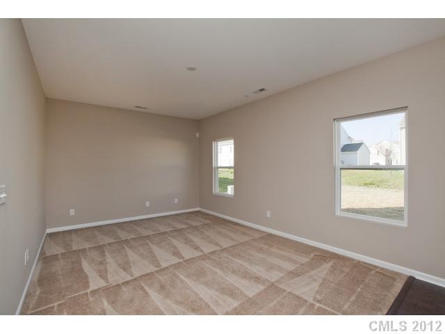 2211 Durand Road, Unit 77 Fort Mill, SC 29715 - Photo 5 of 16 a view of an empty room with a window