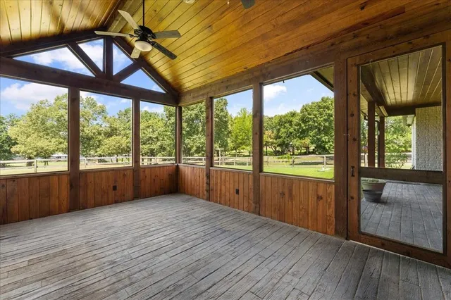a living room with hard wood floor