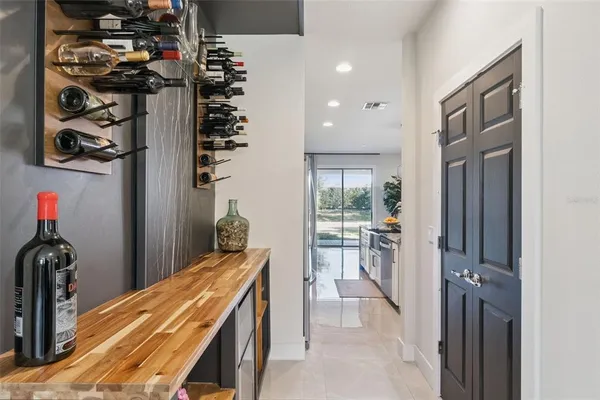 a view of a hallway with front door