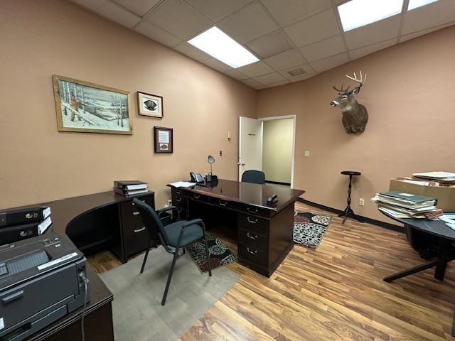 301 Chestnut Street Virginia, MN 55792 - Photo 9 of 31 Office area featuring light wood-style floors and a paneled ceiling