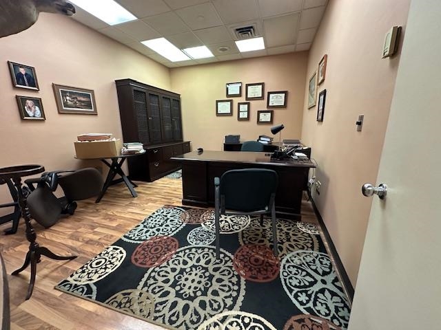 301 Chestnut Street Virginia, MN 55792 - Photo 10 of 31 Home office featuring a paneled ceiling