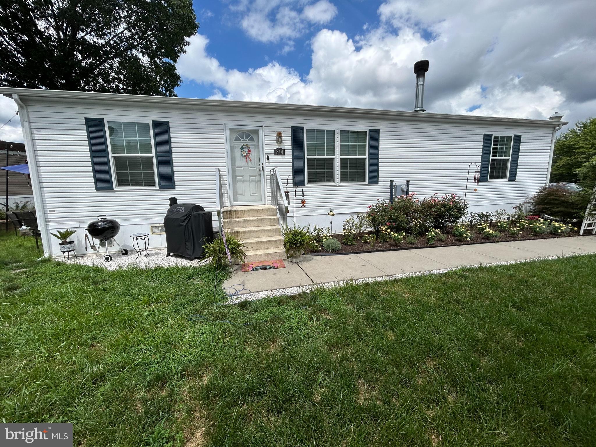 814 North Street Jackson, NJ 08527 - Photo 1 of 19 a view of house with backyard outdoor seating and garden