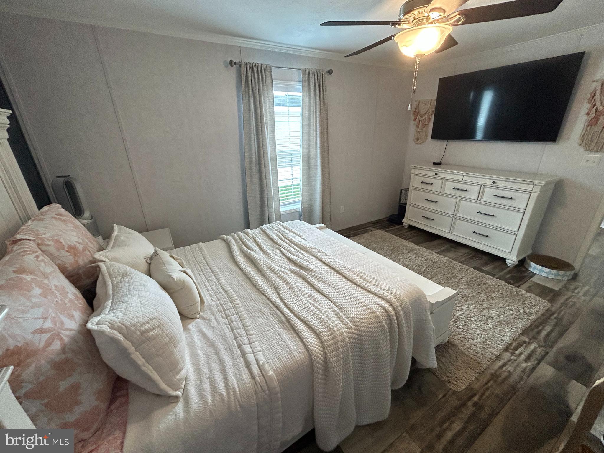 814 North Street Jackson, NJ 08527 - Photo 11 of 19 a bedroom with a bed and a television