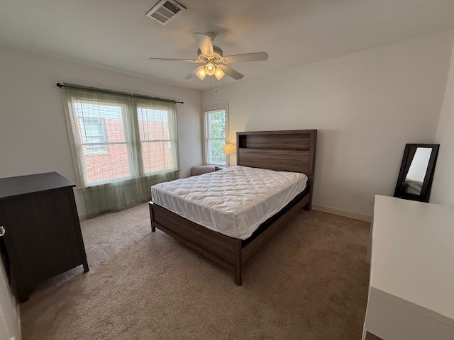 1710 Bolsover Street, Unit 2 Houston, TX 77005 - Photo 17 of 22 a bedroom with a bed and window