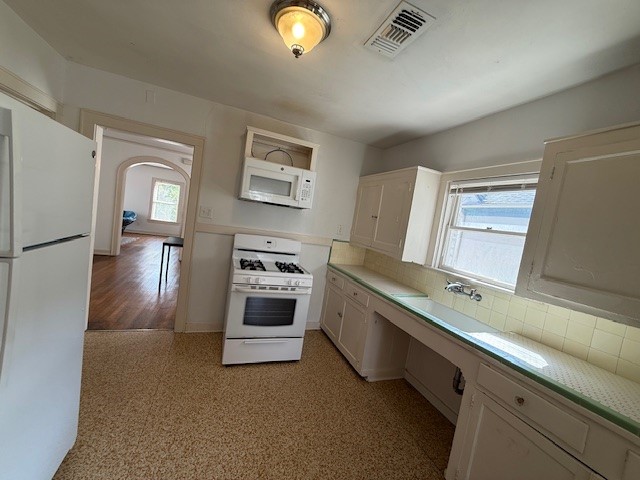 1710 Bolsover Street, Unit 2 Houston, TX 77005 - Photo 10 of 22 a room with a bed and a view of en suite bathroom