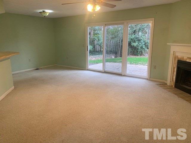7743 Falcon Rest Circle Raleigh, NC 27615 - Photo 3 of 11 Dining area perfect with view of tree line buffer.