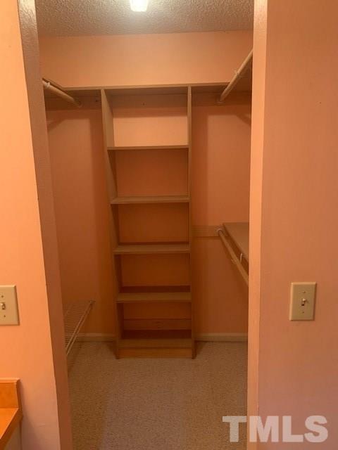 7743 Falcon Rest Circle Raleigh, NC 27615 - Photo 10 of 11 Master Closet with built ins.